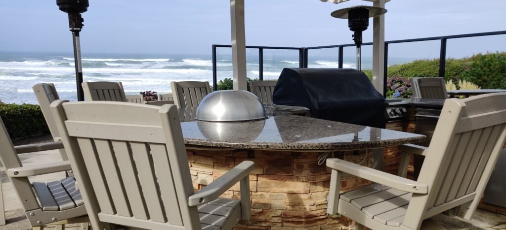 Bar top fire pit with iridescent glass pebbles for ambience